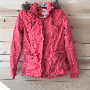 Bright salmon colored winter jacket with hood